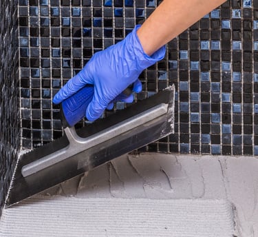 Installing bathroom tile is made easy when you've got the right tools on hand.