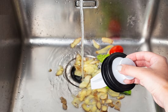 food waste clogging garbage disposal