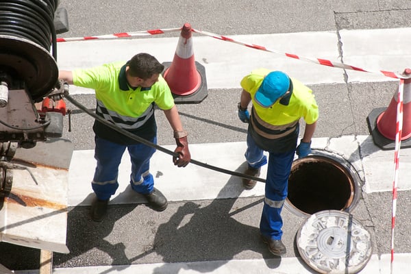 plumbers conduct sewer line inspection 